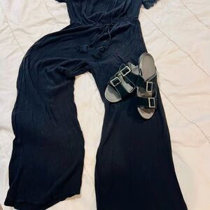 black off-the-shoulder wide-leg jumpsuit by Blush